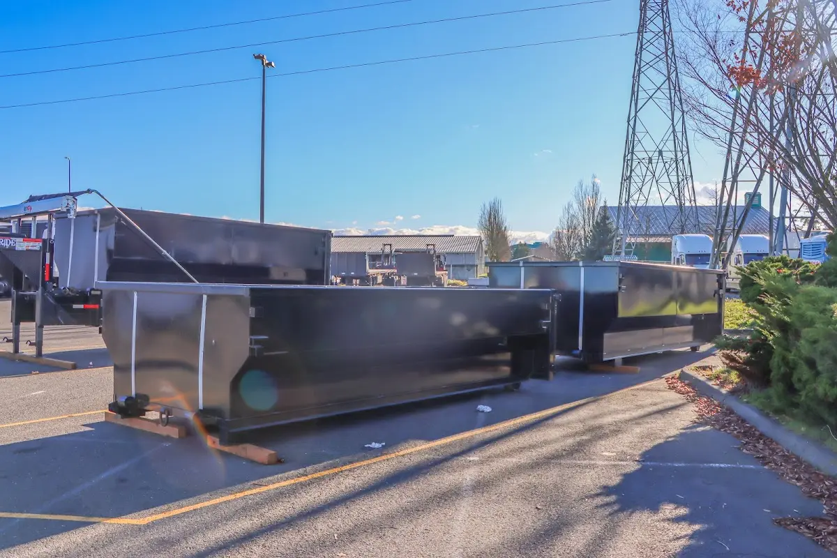 Roll-off dumpster ready for waste disposal at job site for Demolition Dumpster Rental in Franklin Lakes